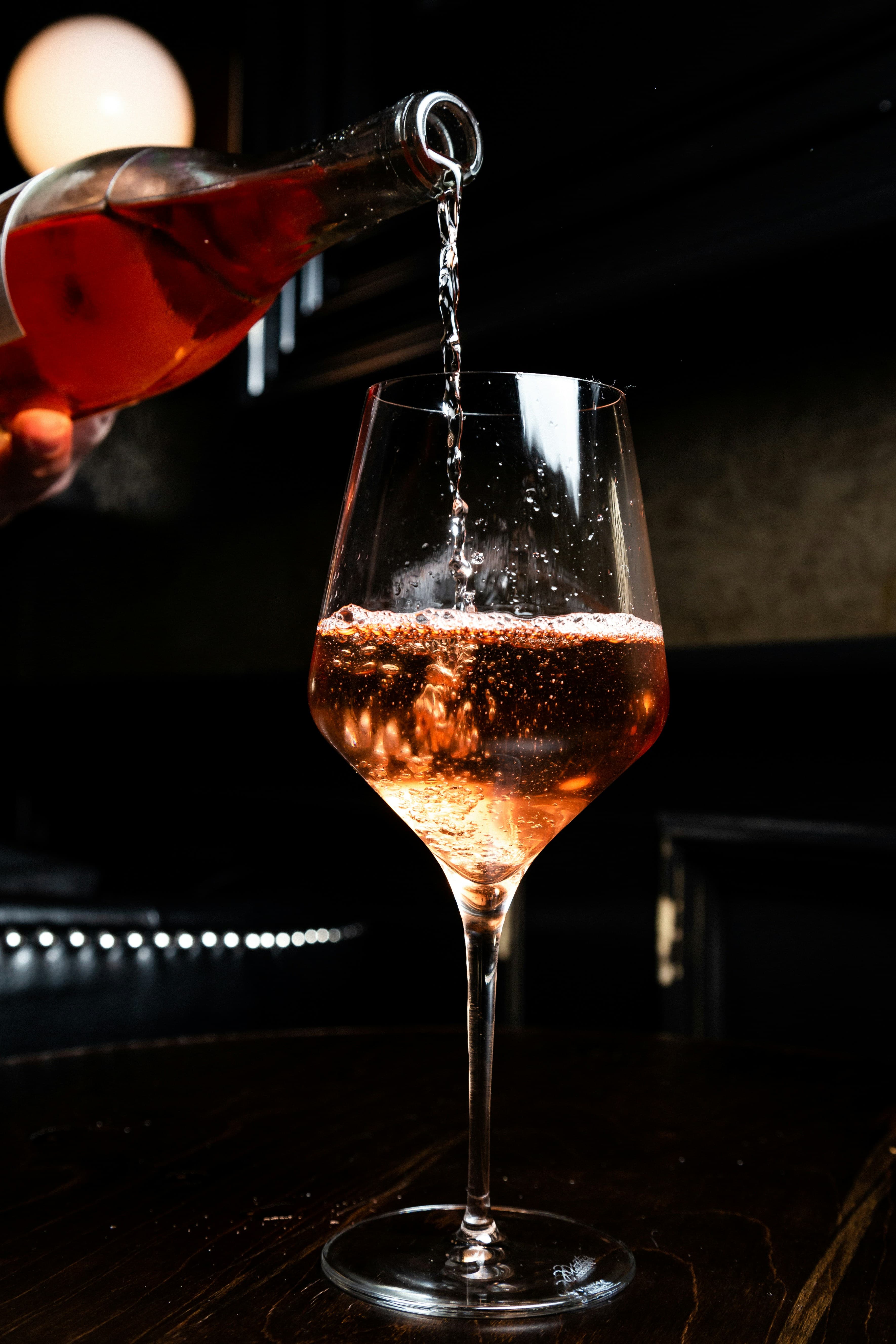 Wine tasting or bottle presentation showcasing Chinese winery and speciality wine export positioning.